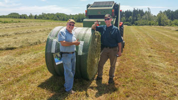 Mr Bonnyman - beef farmer (left) and Arden Little of Green Diamond Equipment (right)